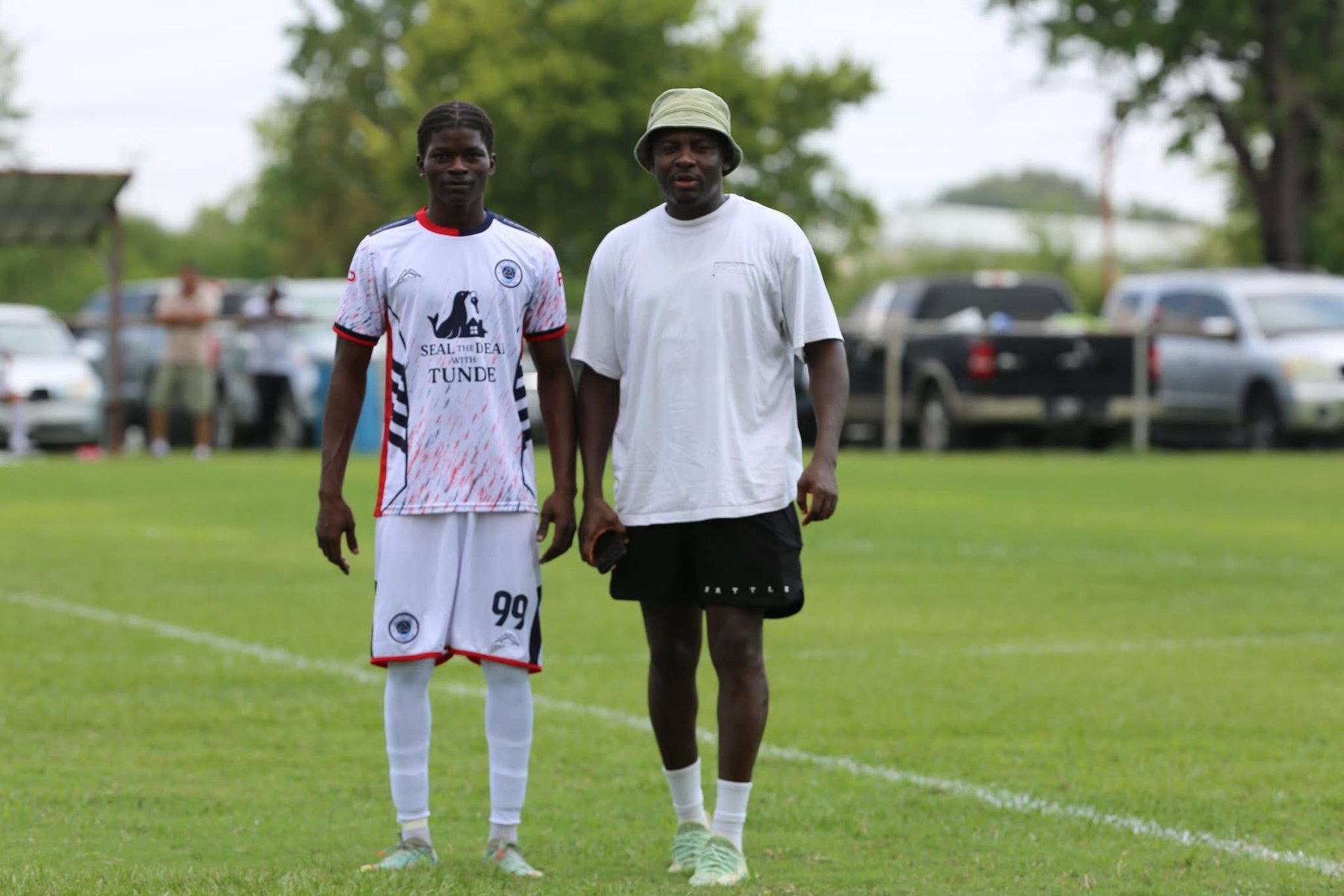 Community football participant with a team player
